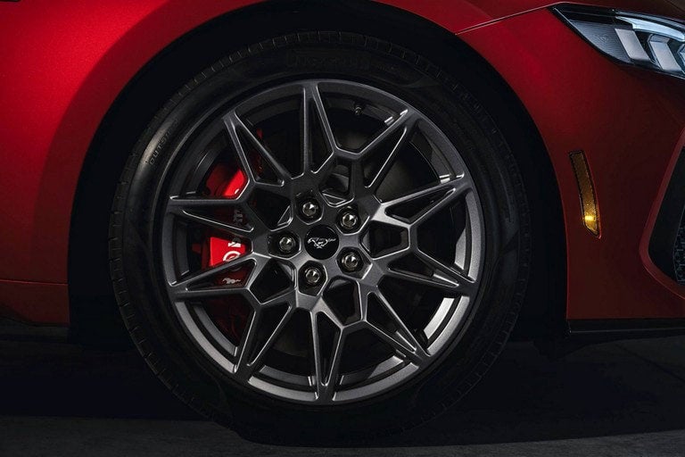2024 Ford Mustang® model with a close-up of a wheel and brake caliper | Bob Sight Ford Inc in Lees Summit MO